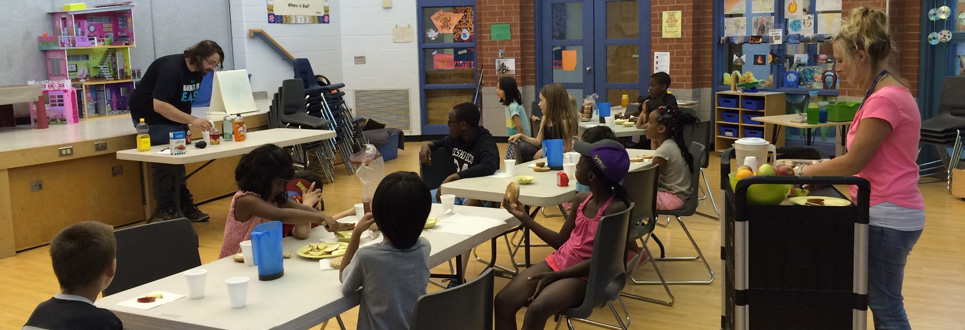 Students attending a breakfast club in a classroom