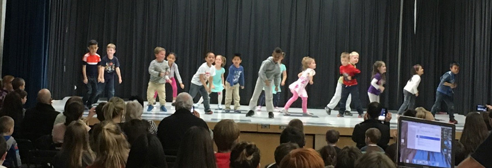 Kindergarten students on a stage